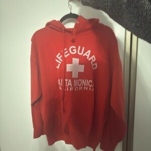 Lifeguard Santa Monica Red Hoodie & Forever 21 cream hoodie with red graphic.